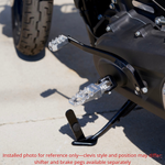 Four TC Bros. Pro Series MX Lite Footpegs for 1977-2022 Harley-Davidson in silver, black, and gold are arranged vertically on a white background.