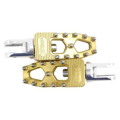 A pair of TC Bros. Pro Series Gold MX Lite Rider Foot Pegs for 2018-newer Harley Softail & Pan America with adjustable foot pegs on a white background.