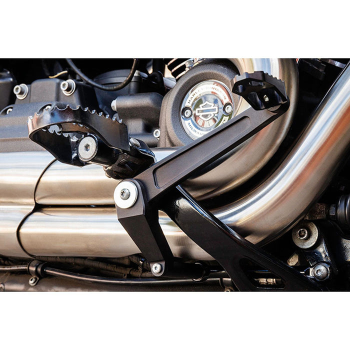 A black Mid Mount Brake Pedal for M8 Softail® Models, including bolts, washers, and additional components laid out separately, reminiscent of the precise craftsmanship seen in S&S Cycle products.