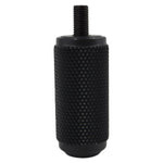 A TC Bros. black cylinder with a screw on it.