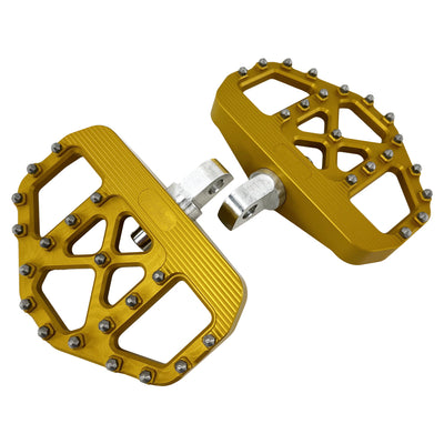 A pair of gold TC Bros. Pro Series MX Mini Floorboards for Harley Davidson Models.