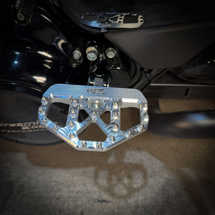 A pair of TC Bros. Pro Series MX Passenger Mini Floorboards for 2018-newer Harley Softail & Pan America.