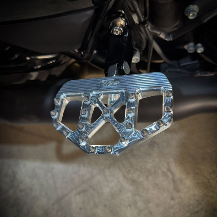 A pair of TC Bros. Pro Series MX Passenger Mini Floorboards for 2018-newer Harley Softail & Pan America.