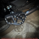 Three TC Bros. Pro Series MX Mini Floorboards for 1977-2022 Harley-Davidson in silver, black, and gold are shown on a white background, each featuring flat metal platforms with grip pins for adjustable foot peg mounting.