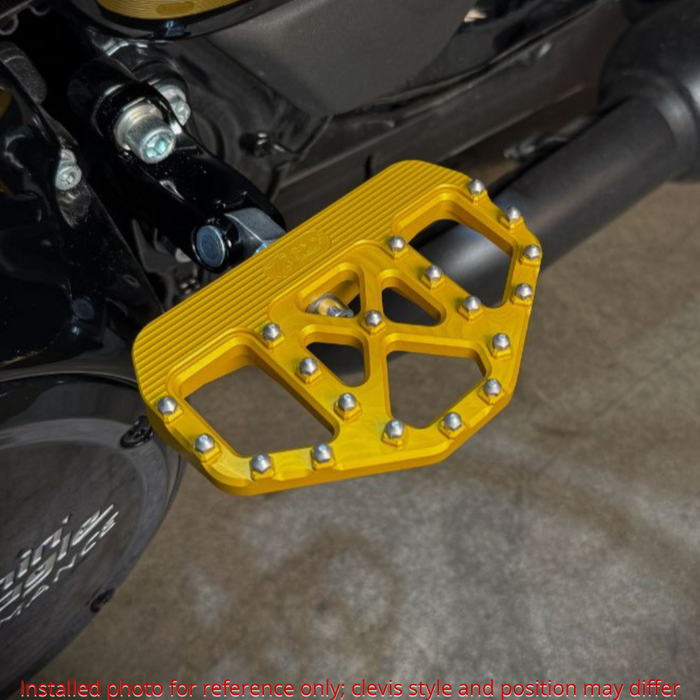 Three TC Bros. Pro Series MX Mini Floorboards for 1977-2022 Harley-Davidson in silver, black, and gold are shown on a white background, each featuring flat metal platforms with grip pins for adjustable foot peg mounting.