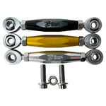 TC Bros. Pro Series Adjustable Shifter Linkage for 1999-2017 Harley-Davidson Dyna features black, gold, and silver turnbuckles with engraved logos, plus two bolts and a nut—ideal for those seeking precise shifter adjustment.