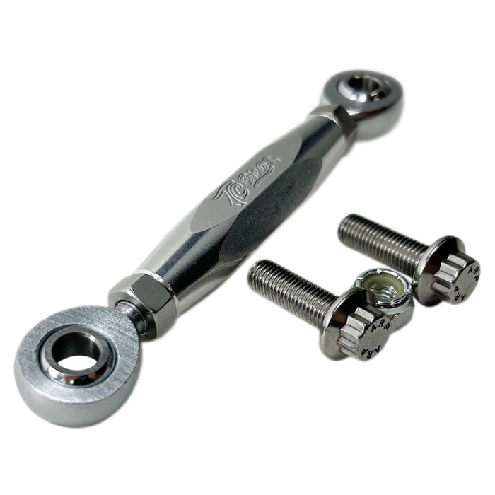 Three TC Bros. Harley Dyna Adjustable Shifter Linkages for Mid Controls in black, gold, and silver, arranged horizontally with two bolts and a nut displayed below them. Perfect for enhancing your Harley Davidson Dyna&