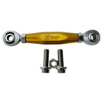 TC Bros. Pro Series Adjustable Shifter Linkage for 1999-2017 Harley-Davidson Dyna features black, gold, and silver turnbuckles with engraved logos, plus two bolts and a nut—ideal for those seeking precise shifter adjustment.