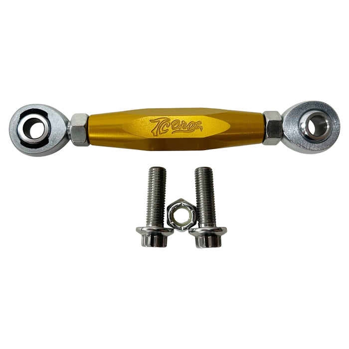 Three TC Bros. Harley Dyna Adjustable Shifter Linkages for Mid Controls in black, gold, and silver, arranged horizontally with two bolts and a nut displayed below them. Perfect for enhancing your Harley Davidson Dyna&