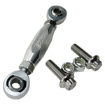The TC Bros. Pro Series Adjustable Shift Linkage for 1991-Up Harley-Davidson Dyna, FXR, and Softail includes three metal links in black, gold, and silver with engraved branding—ideal for customizing shift linkage or use with TC Bros. mid controls.
