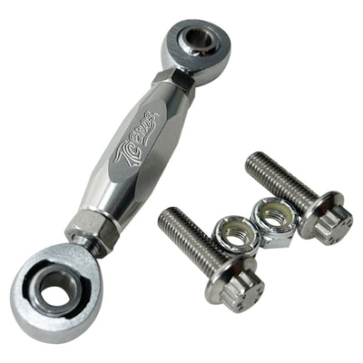 The TC Bros. FXR & M8 Softail Adjustable Shifter Linkage for Mid Controls showcases three adjustable turnbuckle rod ends in black, gold, and silver, arranged vertically. Crafted from CNC machined aluminum, these precision parts are ideal for Harley Davidson shifter linkage applications. Two bolts and two nuts are neatly placed below the rod ends, completing the arrangement.