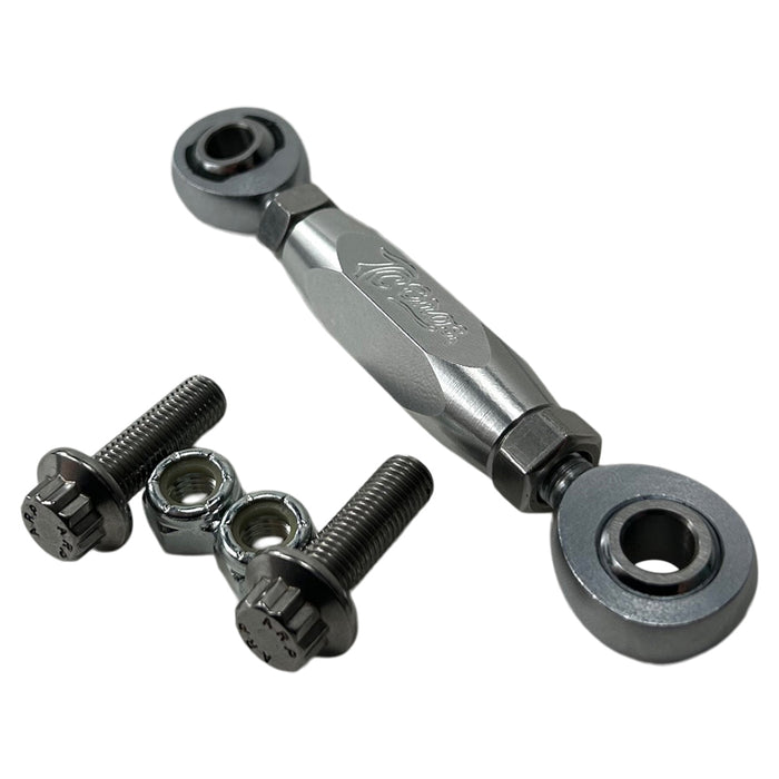 The TC Bros. FXR & M8 Softail Adjustable Shifter Linkage for Mid Controls showcases three adjustable turnbuckle rod ends in black, gold, and silver, arranged vertically. Crafted from CNC machined aluminum, these precision parts are ideal for Harley Davidson shifter linkage applications. Two bolts and two nuts are neatly placed below the rod ends, completing the arrangement.