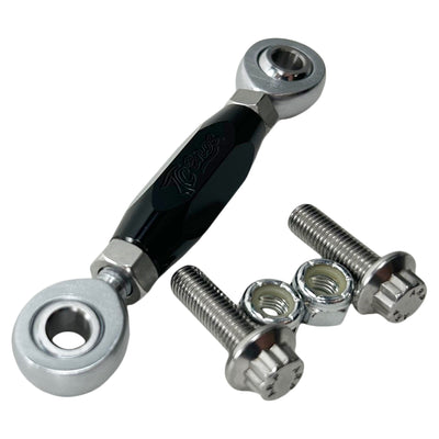 The TC Bros. FXR & M8 Softail Adjustable Shifter Linkage for Mid Controls showcases three adjustable turnbuckle rod ends in black, gold, and silver, arranged vertically. Crafted from CNC machined aluminum, these precision parts are ideal for Harley Davidson shifter linkage applications. Two bolts and two nuts are neatly placed below the rod ends, completing the arrangement.