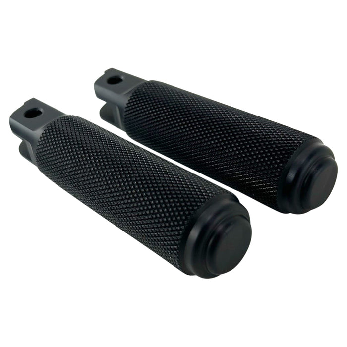 Two black TC Bros. Nomad Rider Foot Pegs fits 2018-up Harley Softail M8 & Pan America - Black with textured grips and mounting brackets, shown side by side against a white background.