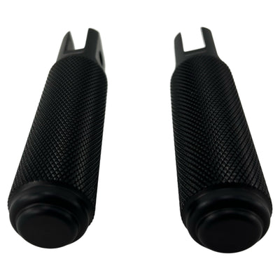 Two black TC Bros. Nomad Rider Foot Pegs fits 2018-up Harley Softail M8 & Pan America - Black with textured grips and mounting brackets, shown side by side against a white background.