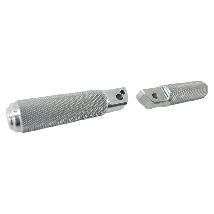 Two TC Bros. Nomad Passenger Foot Pegs fits 2018-up Harley Softail M8 & Pan America, crafted from aircraft grade aluminum with textured grips, are placed side by side on a white background.