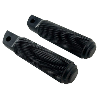 A pair of TC Bros. Nomad Passenger Foot Pegs fits 2018-up Harley Softail M8 & Pan America - Black with a knurled surface traction, offering a textured grip and a mounting hole near the base. Perfectly compatible as Harley Softail foot pegs, they promise enhanced stability and style for your ride.