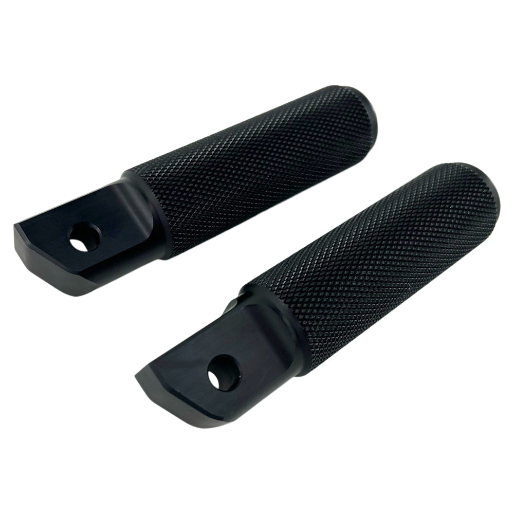 A pair of TC Bros. Nomad Passenger Foot Pegs fits 2018-up Harley Softail M8 & Pan America - Black with a knurled surface traction, offering a textured grip and a mounting hole near the base. Perfectly compatible as Harley Softail foot pegs, they promise enhanced stability and style for your ride.