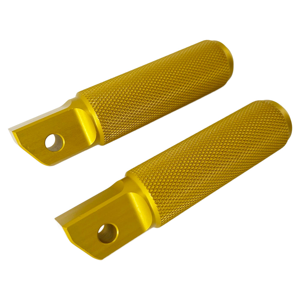 Two TC Bros. Nomad Passenger Foot Pegs fits 2018-up Harley Softail M8 & Pan America - Gold, with a textured finish and holes for attachment, resembling Harley Softail foot pegs, positioned parallel to each other.