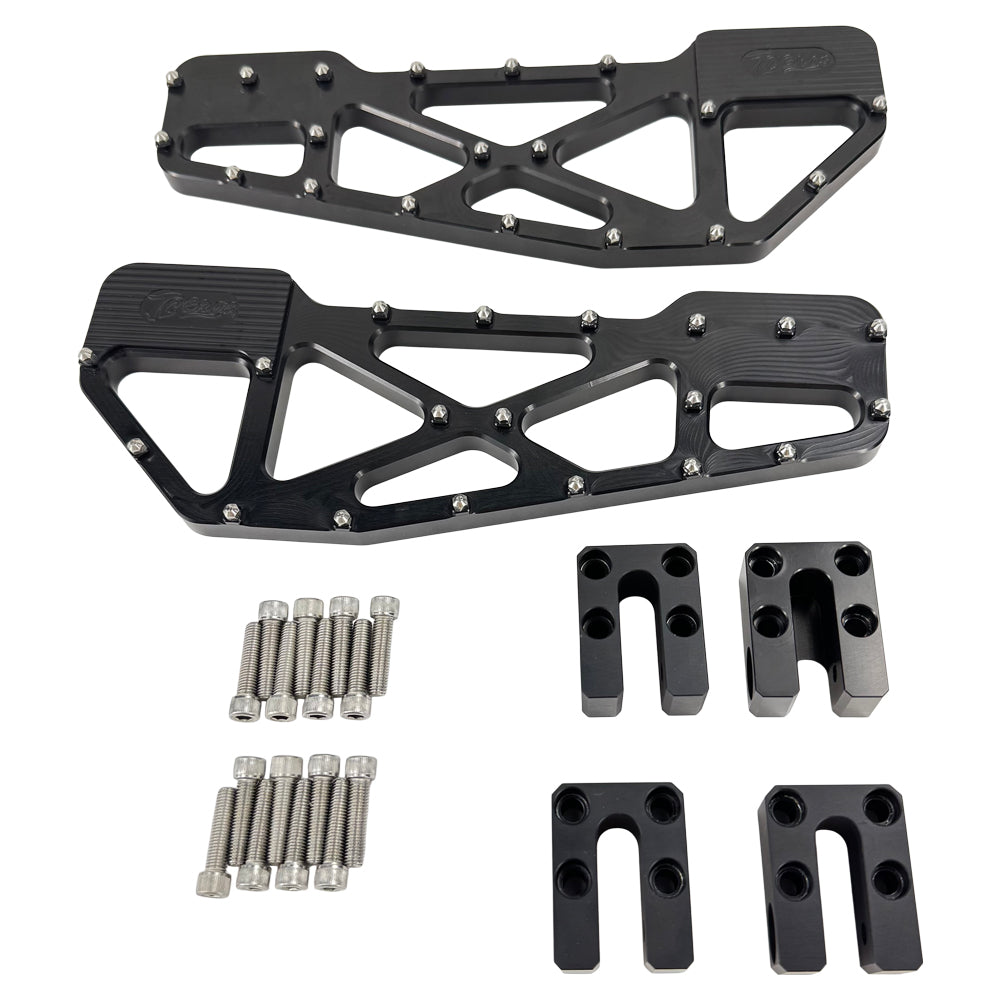 TC Bros. Pro Series MX Slim Floorboards for Harley Davidson Bagger Touring Models feature a skeletal design with metal pins, resembling high-performance pedals in silver, black, and gold. Arranged diagonally, they offer a striking visual appeal.