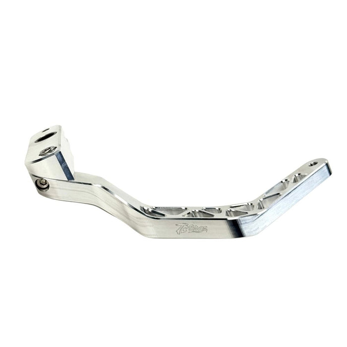 The TC Bros. Pro Series Truss Brake Pedal fits 1991-2017 Harley-Davidson Dyna models, featuring a billet aluminum construction with cut-out triangular patterns and mounting holes.
