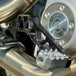The TC Bros. Pro Series Truss Brake Pedal fits 1991-2017 Harley-Davidson Dyna models, featuring a billet aluminum construction with cut-out triangular patterns and mounting holes.