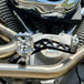 The TC Bros. Pro Series Truss Brake Pedal fits 1991-2017 Harley-Davidson Dyna models, featuring a billet aluminum construction with cut-out triangular patterns and mounting holes.