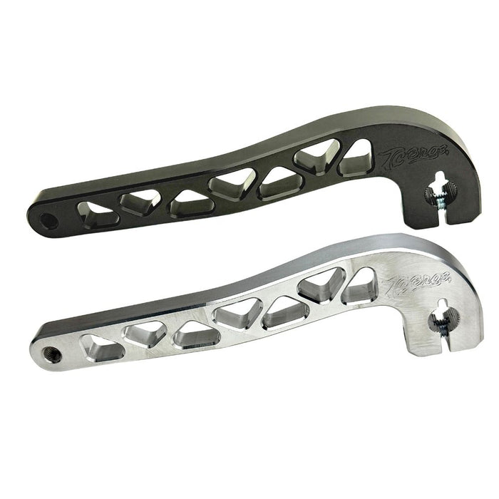 Two billet aluminum TC Bros. Pro Series Truss Shift Levers for 1991-2017 Harley-Davidson Dyna, one black and one silver, with cutout geometric patterns, are displayed on a white background—perfect for your next CNC machined upgrade.