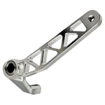 The TC Bros. Pro Series Truss Brake Arm is a 6061-T6 aluminum upgrade for 2018-up Harley-Davidson Softail brake pedals, featuring triangular cutouts and a circular mounting hole—available in silver or black.