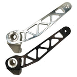 The TC Bros. Pro Series Truss Brake Arm is a 6061-T6 aluminum upgrade for 2018-up Harley-Davidson Softail brake pedals, featuring triangular cutouts and a circular mounting hole—available in silver or black.