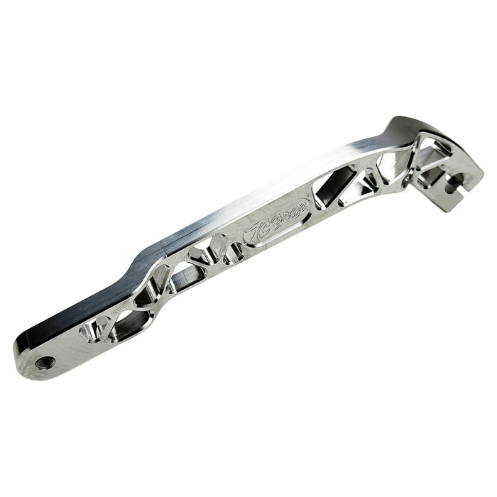 The TC Bros. Pro Series Truss Shift Lever for 2018-Up Harley-Davidson M8 Softail features silver and black metal lever arms with geometric cut-outs and "TC Bros." engraving—ideal for your Softail upgrade.