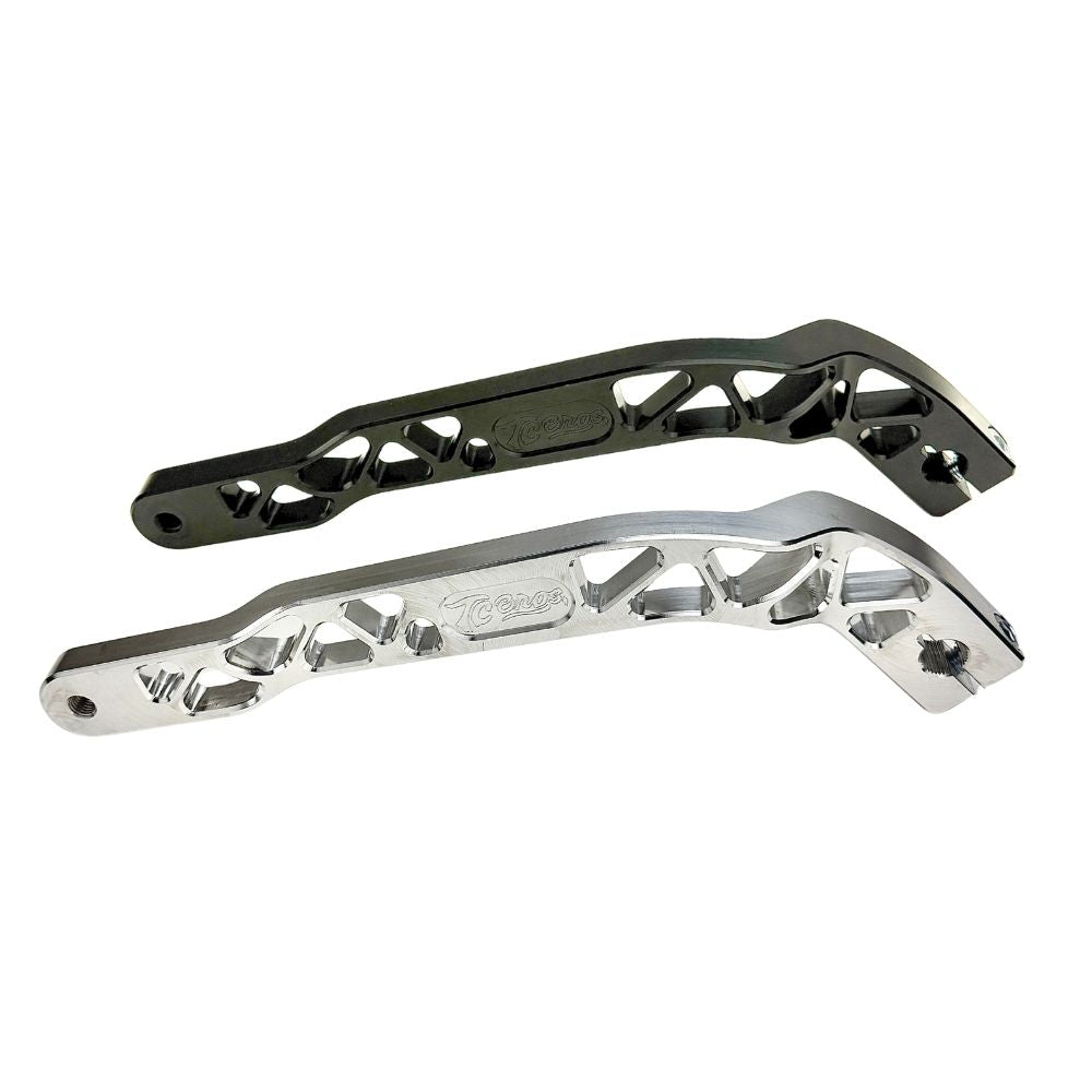 The TC Bros. Pro Series Truss Shift Lever for 2018-Up Harley-Davidson M8 Softail features silver and black metal lever arms with geometric cut-outs and "TC Bros." engraving—ideal for your Softail upgrade.