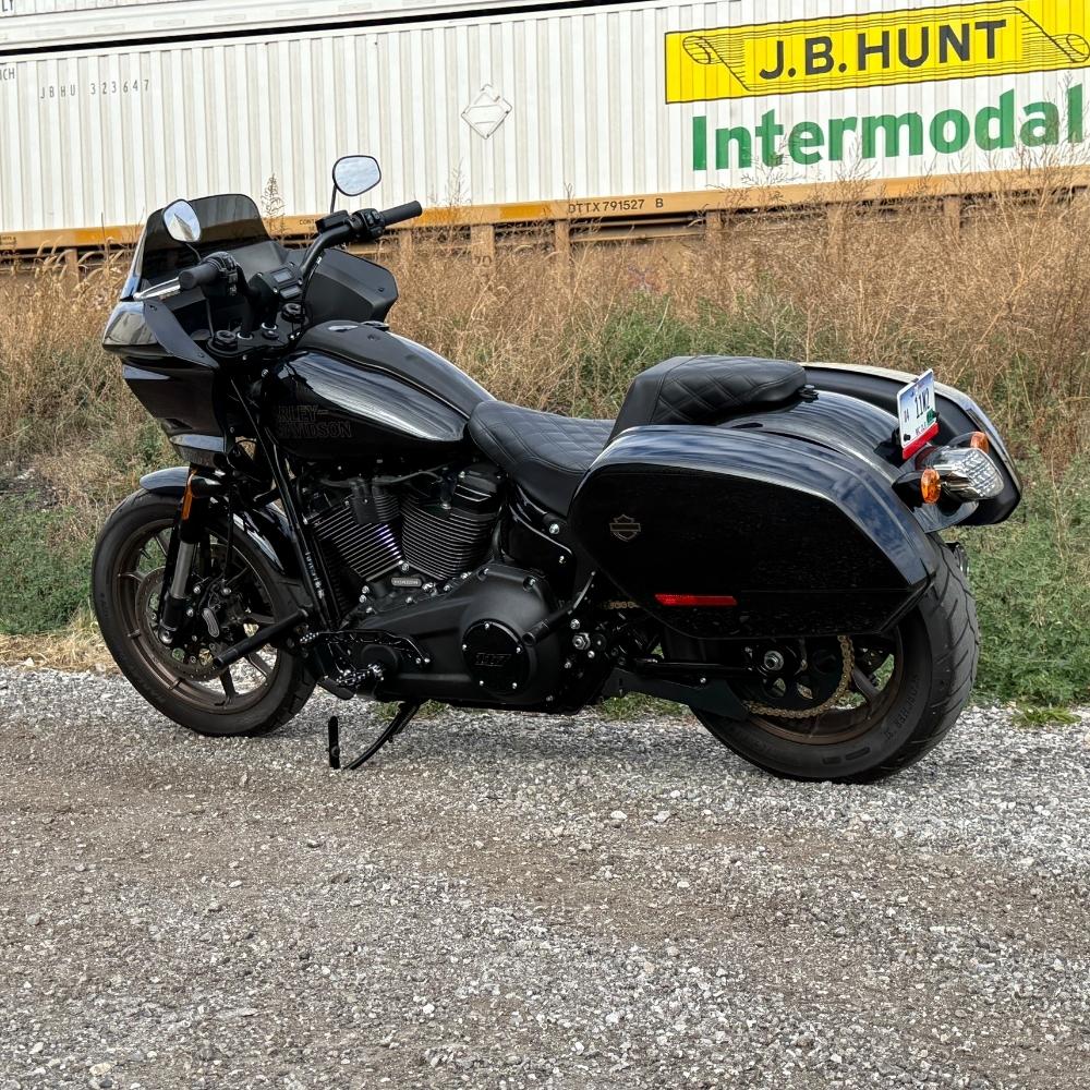 The TC Bros. Pro Series Truss Shift Lever for 2018-Up Harley-Davidson M8 Softail features silver and black metal lever arms with geometric cut-outs and "TC Bros." engraving—ideal for your Softail upgrade.