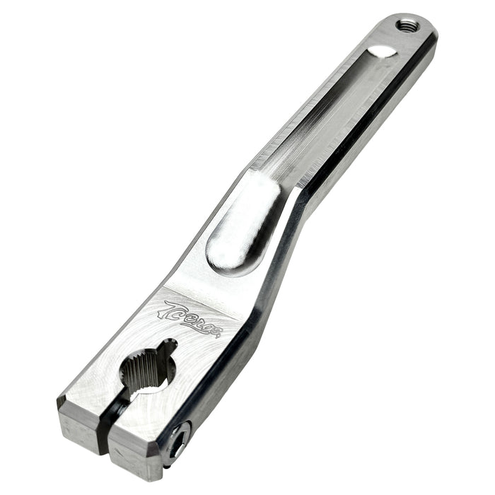 Two silver-finished metal bicycle crank arms, each with a slot and hole for attachment—crafted with the same precision as the TC Bros. Pro Series Shift Lever for 1982-Up Harley-Davidson Big Twin.