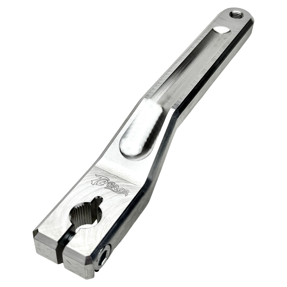 Two silver-finished metal bicycle crank arms, each with a slot and hole for attachment—crafted with the same precision as the TC Bros. Pro Series Shift Lever for 1982-Up Harley-Davidson Big Twin.