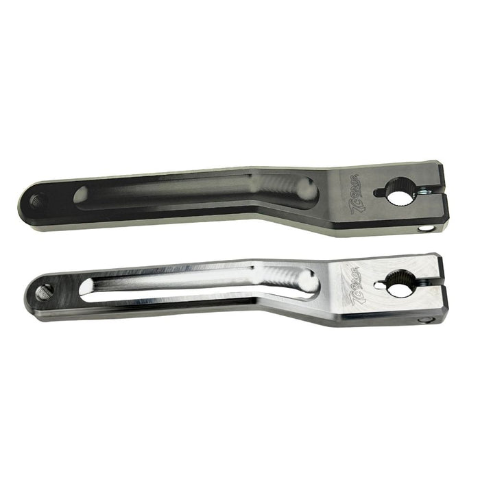 Two silver-finished metal bicycle crank arms, each with a slot and hole for attachment—crafted with the same precision as the TC Bros. Pro Series Shift Lever for 1982-Up Harley-Davidson Big Twin.