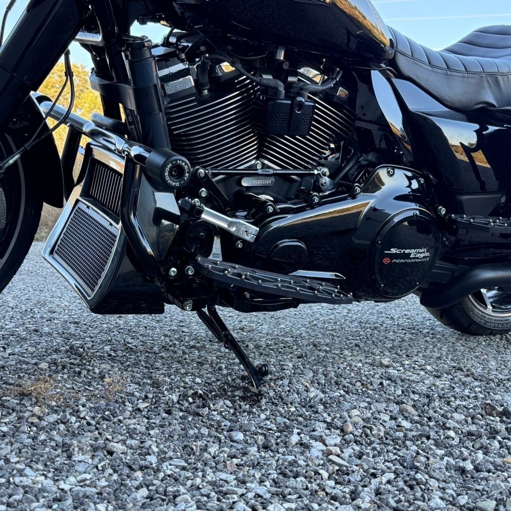 Two silver-finished metal bicycle crank arms, each with a slot and hole for attachment—crafted with the same precision as the TC Bros. Pro Series Shift Lever for 1982-Up Harley-Davidson Big Twin.