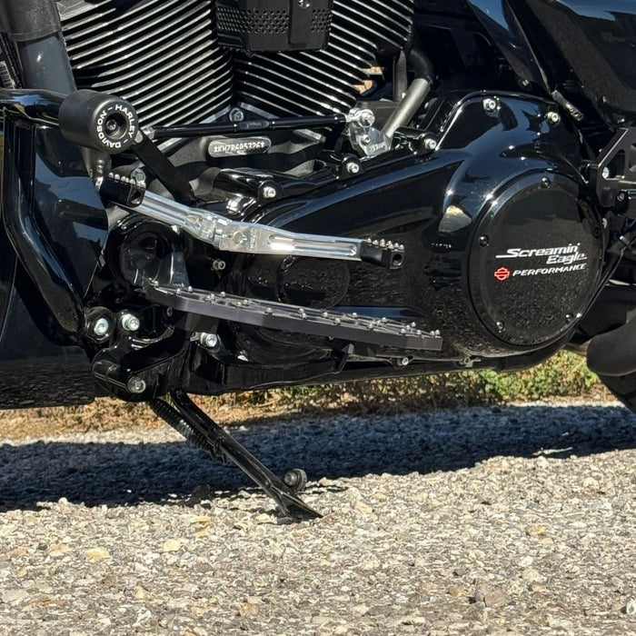 Two silver-finished metal bicycle crank arms, each with a slot and hole for attachment—crafted with the same precision as the TC Bros. Pro Series Shift Lever for 1982-Up Harley-Davidson Big Twin.