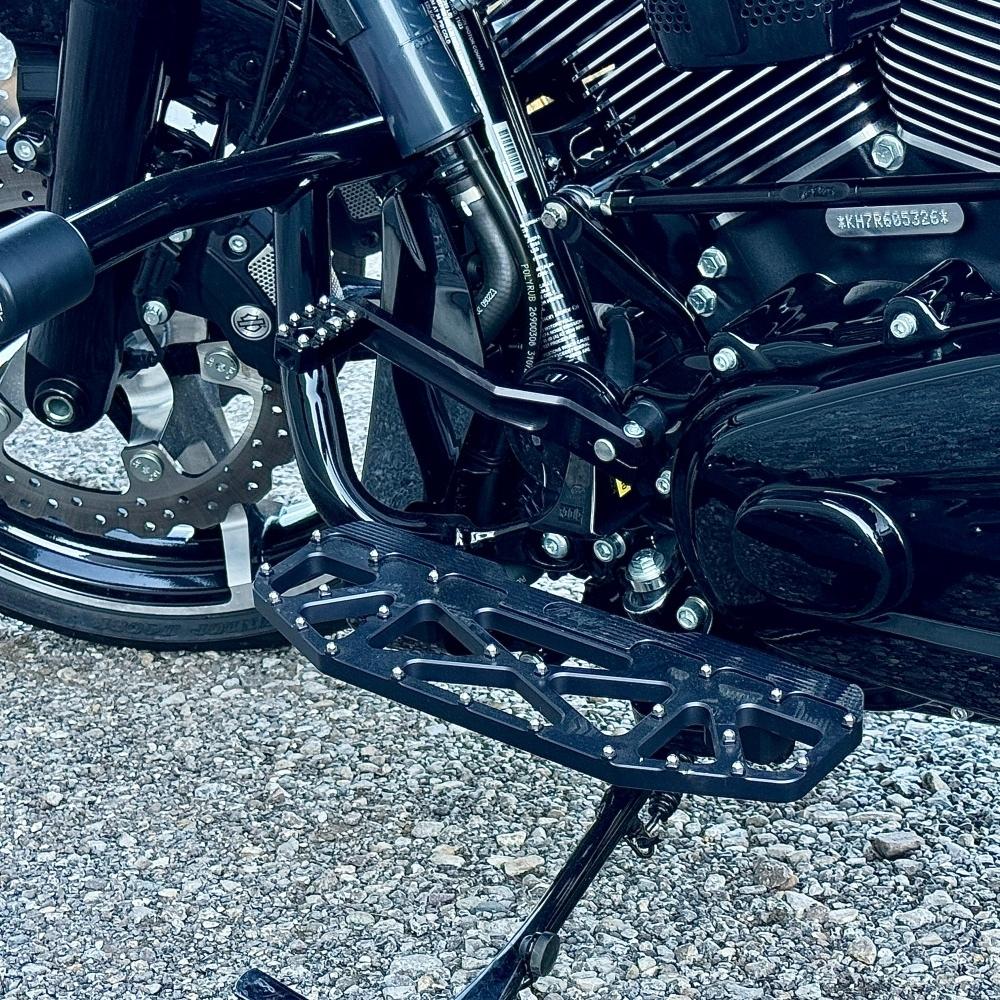 Two silver-finished metal bicycle crank arms, each with a slot and hole for attachment—crafted with the same precision as the TC Bros. Pro Series Shift Lever for 1982-Up Harley-Davidson Big Twin.
