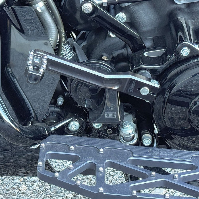 Two silver-finished metal bicycle crank arms, each with a slot and hole for attachment—crafted with the same precision as the TC Bros. Pro Series Shift Lever for 1982-Up Harley-Davidson Big Twin.