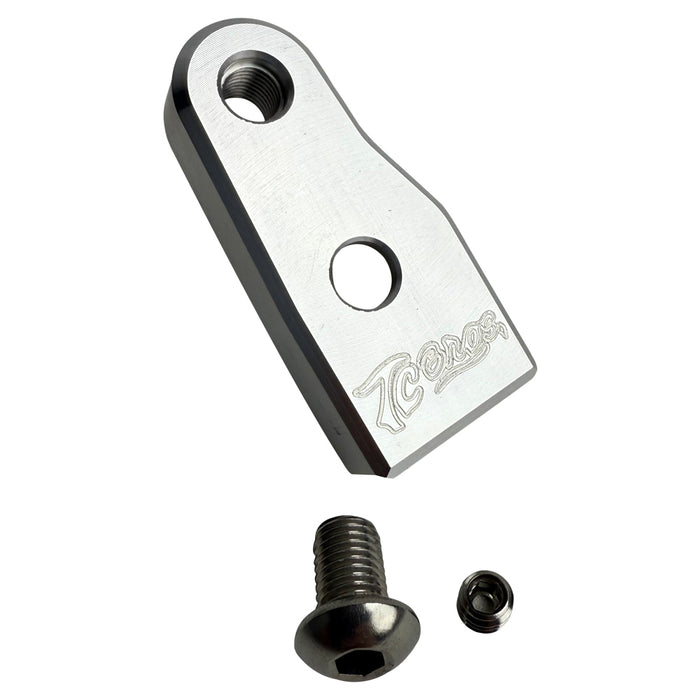 The TC Bros. Pro Series Easy Shift Lever Extension for Harley-Davidson Big Twin—Twin Cam includes silver and black metal brackets with threaded holes, engraved logos, and screws. Fits Touring, Dyna, and Softail models.