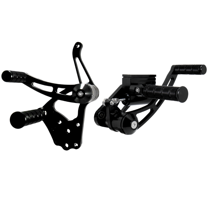 Four Mid-USA billet aluminum rearset foot peg assemblies, including a silver and black Complete Forward Controls Kit for 1936-1999 Harley-Davidson Big Twin, are shown against a white background.