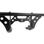 The TC Bros. Front Crash Bar for Harley-Davidson M-8 Softail w/ Mid Controls is a black metal engine guard, shown with mounting hardware—bolts, washers, spacers, and brackets—ideal for added protection on your Softail.