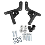 The TC Bros. Rear Crash Bar for Harley-Davidson M8 Softail includes black metal brackets, bolts, washers, nuts, spacers, and CNC-machined Delrin® sliders from TC Bros., all arranged on a white background.