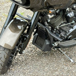 The TC Bros. Front Crash Bar mounting kit for 2014-2023 Harley-Davidson Touring includes bolts and spacers, shown above a motorcycle image—ideal for front engine guard or crash bar installation.