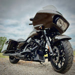 Two black metal TC Bros. Rear Saddlebag Guards with mounting holes, four bolts, two nuts, and four rubber grommets are arranged on a white background—essential components from TC Bros. for installing rear saddlebag guards on 2009-up Harley-Davidson Touring models to enhance rear crash protection.