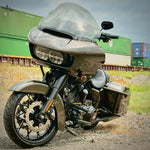 Two black metal TC Bros. Rear Saddlebag Guards with mounting holes, four bolts, two nuts, and four rubber grommets are arranged on a white background—essential components from TC Bros. for installing rear saddlebag guards on 2009-up Harley-Davidson Touring models to enhance rear crash protection.