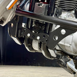 The TC Bros. Front Crash Bar for 2004-2022 Harley-Davidson Sportster features black metal arms and a horizontal bar with multiple mounting holes, offering added crash protection. Shown on a white background. Brand: TC Bros.