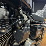 A TC Bros. Sportster Coil Relocation Kit fits 1995-2003 with nuts and bolts, perfect for a Harley Davidson Sportster.