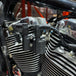 A TC Bros. Coil Relocation Bracket 2007-newer Harley Sportster on a white background.